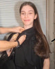 Girl showing how to dress using Happy Cloud adaptive shirt with a broken arm.